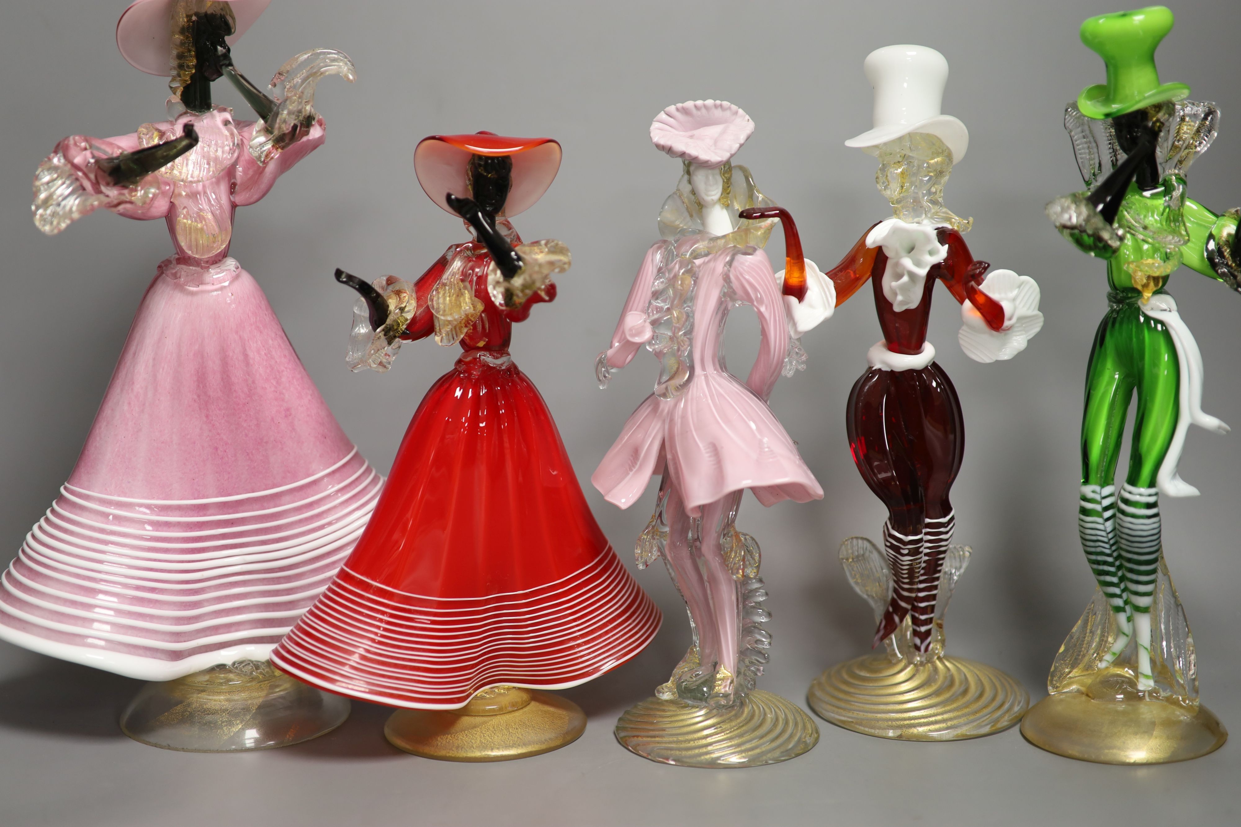 A group of eight Murano glass figures of dancers, tallest 32cm